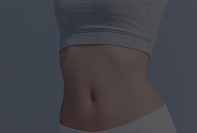 Tummy tuck improving skin elasticity by removing excess skin above navel at NANA Plastic Surgery