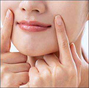 Improving sagging cheeks through buccal fat removal at NANA Plastic Surgery