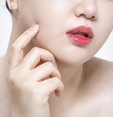 Facial liposuction to reduce larger face appearance due to excess fat